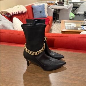 Black Pointed-Toe Mid-Calf Boots with Gold Chain Accent